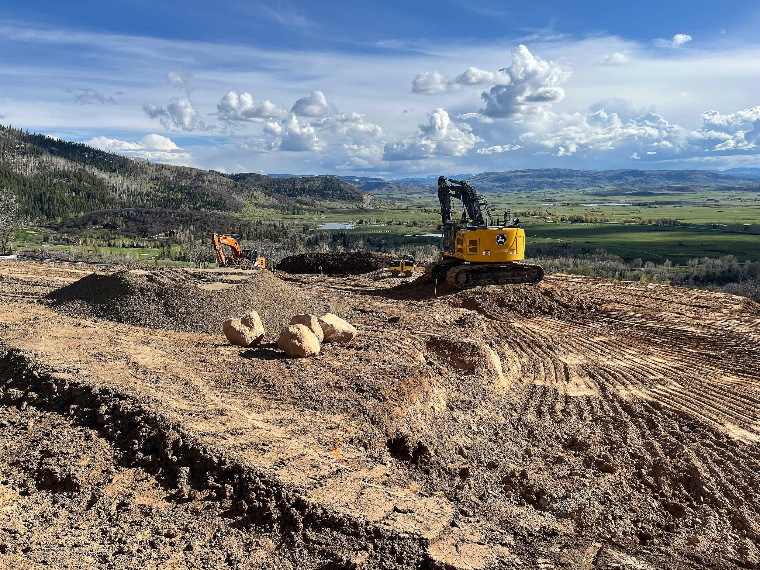 Excavator Grading Valley Overlook