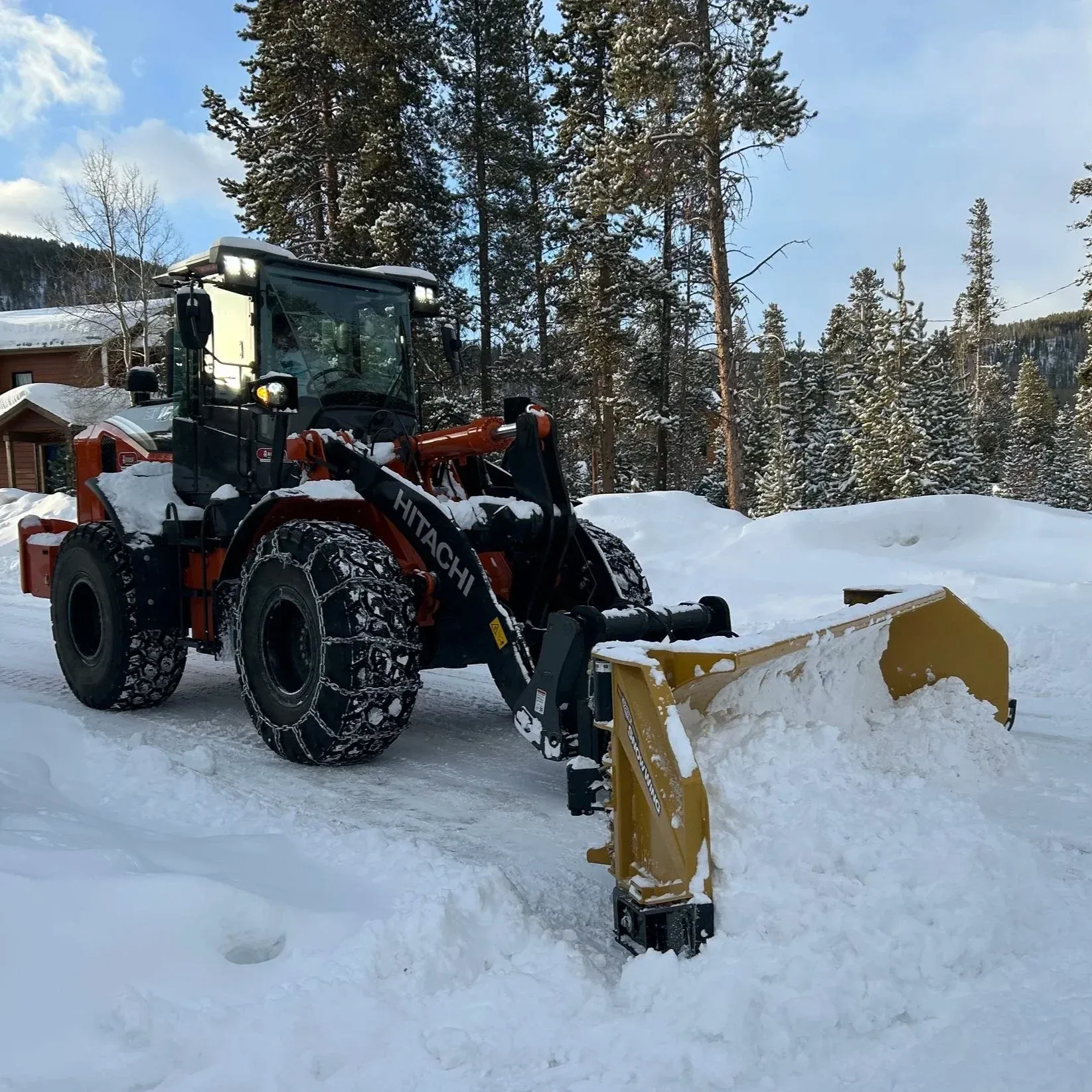 Alpine Snowworks plow clearing snow